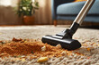 vacuum cleaner that cleans crumbs and dirt spilled on the carpet