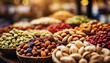 dried fruit and nuts. A deluxe display of various mixed nuts in an upscale grocery or specialty store, highlighting the exquisite selection and quality of each variety. The nuts are artfully arranged 