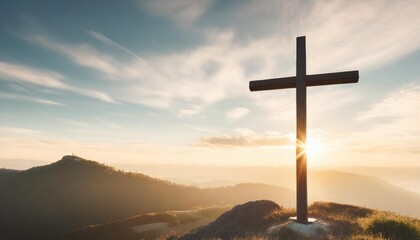 Wall Mural - crucifixion of jesus christ at sunrise a christian cross on top of a hill at sunset easter and christian concept horizontal background copy space for text