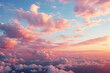 Gorgeous view of pink cumulus clouds at sunrise from high altitude flight in the morning
