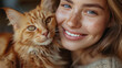 A charming girl with a beaming smile poses with her fluffy orange cat indoors, showcasing joy and togetherness