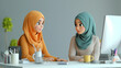 © IM - Two hijab women having a discussion in front of desktop