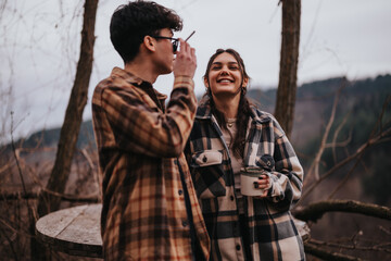 Sticker - Smiling couple sharing a joyful time together, surrounded by nature at their comfortable rural house.