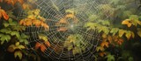 Fototapeta Panele - An arthropods spider web made of natural material is intricately woven among leaves in a forest, creating a beautiful pattern while capturing insects for the terrestrial animal