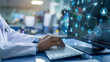 © Fokke Baarssen - A doctor in scrubs with a stethoscope typing passionately on a computer keyboard in a modern medical office, Medicine doctor hand working with modern computer interface as medical network concept,
