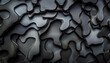 Abstract dark metallic shiny background made of irregularly curved wave patterns.