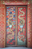 Fototapeta  - Beautiful dragon-pattern door in the temple