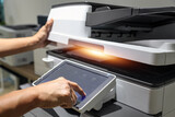Fototapeta Mapy - Hand use copier or photocopier or photocopy machine office equipment workplace for scanner or scanning document or printer for printing paperwork hard copy duplicate Xerox service maintenance repair.