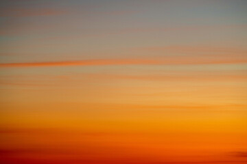 Wall Mural - Sky gradient from blue to orange sunset