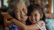 © naphat - Embracing generational bonds a heartwarming moment between grandmother and granddaughter