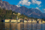 Fototapeta Paryż - Bellagio old town on Lake Como, Italy with mountains in the background