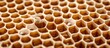 © Randu - close-up of a honeycomb made of wax. The typical hexagonal structure is clearly visible, with some cells open and others closed..AI generated image