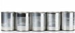 Arrangement of various tin cans placed next to each other in a straight line on a white background