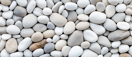 Aufkleber - Many small white and grey stones stacked up closely together in a natural arrangement