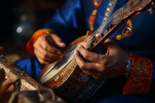 Close-up Of Hands Playing A Traditional Musical Instrument During A Performance