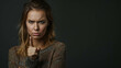Angry Caucasian Woman Making A Disapproving Gesture With Her Finger. Conveying a Sense of Disagreement or Refusal