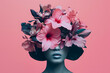 woman with flowers on head isolated on pink background  5c57bbb7-dbe5-4403-b2c1-899cf73a06ea