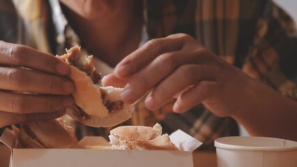 Wall Mural - Man is eating in a restaurant and enjoying delicious food