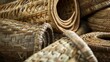 A close-up image of a pile of handwoven baskets. The baskets are made of natural materials and have a variety of shapes and sizes.