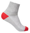 Gray sports ankle sock with red heel and toe design on foot mannequin isolated
