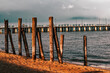 View of the sea or ocean water on an old wooden pier or bridge