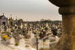 open view of a busy portuguese cemetery showing tombstones and mausoleums. 
