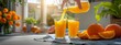 Pouring fresh orange juice into a glass with fresh fruits in background