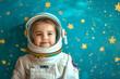 a child girl in an astronaut costume. dreaming of becoming a spaceman. on a background of bright blue wall with yellow stars. generative ai illustration.