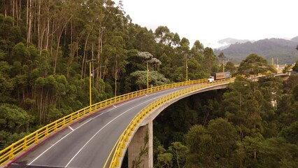 Poster - aerial images of the highway that crosses the central mountain range with its bridges and traffic