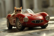 A cat is sitting in a red sports car. The cat is wearing sunglasses, and he is enjoying the ride. Concept of fun and playfulness, as the cat is not just a typical pet, but a daring.