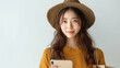 Fashionable Young Woman in Hat with Phone and Shopping Bag, Online Shopping