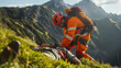 A mountain rescuer tends to a fallen hiker on a steep grassy slope, amidst the remote wilderness.