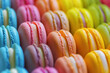 Colorful Macarons - Bright macarons of various flavors, neatly arranged in rows, creating a rainbow of colors