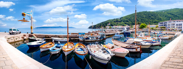 Wall Mural - Small harbour and beach in Mošćenička Draga on the Adriatic coast, Kvarner Bay