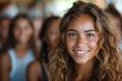 A charming young girl with a beaming smile and curly hair in a candid portrait