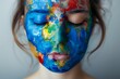 Girl with world map painted on her face .