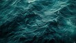 Close-Up of Dark Blue-Green Waves Rippling Across the Surface, Reflecting Light and Depth