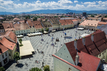 Canvas Print - Aerial view from Council Tower on a historical buildings on Large Square, Old Town of Sibiu, Romania