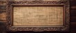 A brown wooden picture frame hangs on a brick wall, displaying a rectangular scroll with intricate patterns. The artwork features tints and shades in handwritten fonts