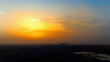 Fototapeta  - Zachód słońca przykryty piaskiem z pustyni, Opolszczyzna Polska, widok z lotu ptaka.