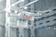 Drone delivering package, technological shipment innovation, fast and safe delivery concept