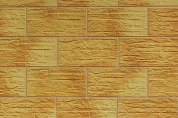 Wall Mural - Yellow bright vibrant paint large brick blocks masonry wall texture background abstract pattern