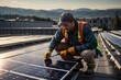 © free - Electrician engineer installing solar panels on rooftop for alternative renewable green energy generation