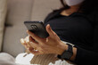 © pixs4u - Asian woman has relaxation time at night with smartphone in living room