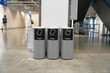 Trash cans with signs to classify waste types in building