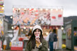 © Jirawatfoto - Woman indulges in a delicious strawberry dish during a trip to Tokyo. A joyful moment of enjoying local flavors and cultural delights.