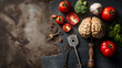 A creative still life of fresh vegetables and a brain model among vintage kitchen utensils.
