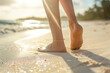 Woman's legs with an metallic golden anklet shimmering in the sunlight on a sandy beach. Generative AI