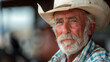© Jammy Jean - Portrait of a Texas man with grey beard and cowboy hat. Composed with copy space.