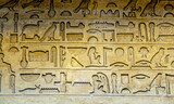Fototapeta Miasto - old egyptian hieroglyphs Hieroglyphs is the writing system ancient Egyptians used for inscriptions mostly on walls of temples and tombs, as well as statues, coffins, and sarcophagi
